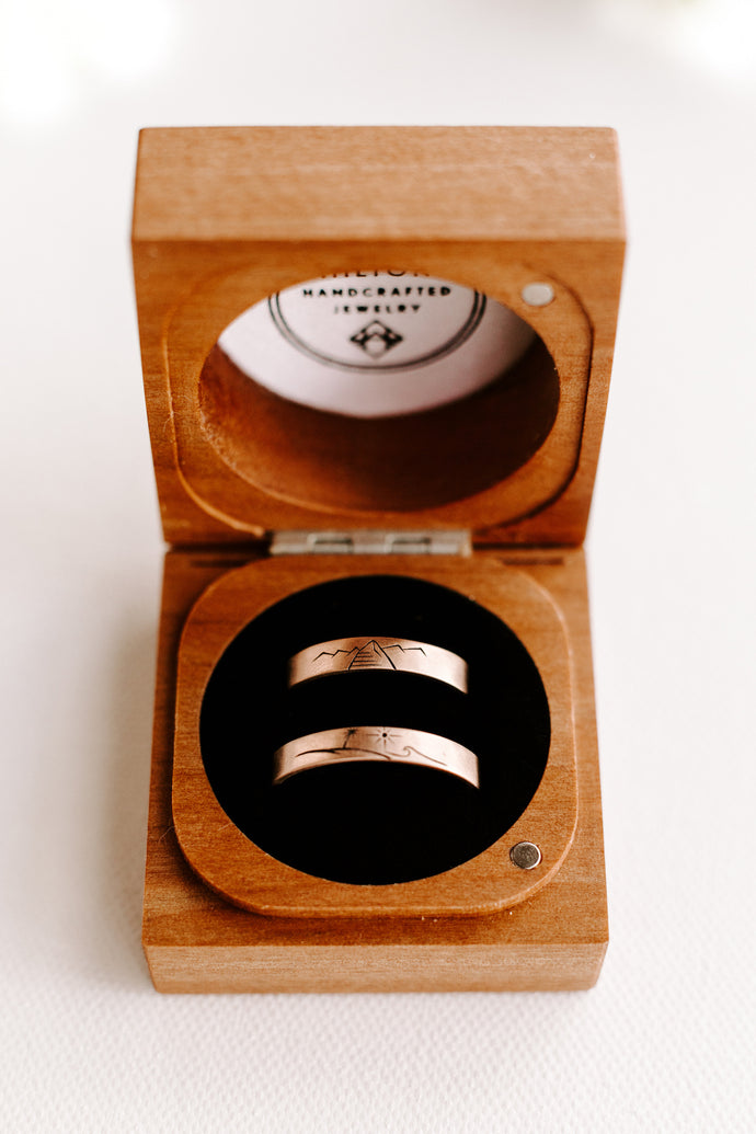 Katie and Christian's Mountain and Sea Custom Rings